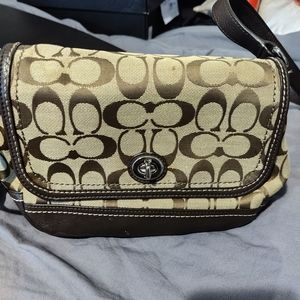 Brown Coach with imperfections